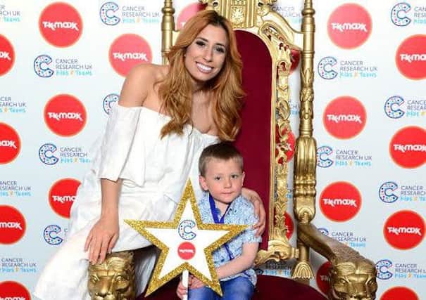 PARTY: Toby Dickens with reality television star Stacey Solomon.