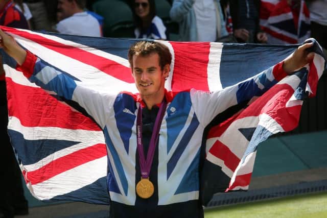 File photo dated 05-08-2012 of Great Britain's Andy Murray with his gold medal. PRESS ASSOCIATION Photo. Issue date: Tuesday December 15, 2015. Murray has frequently cited his Olympic gold medal won on the lawns of Wimbledon as his favourite achievement ahead of his grand slam titles precisely because the victory was for a greater cause than himself. See PA story SPORT Christmas Sportsman. Photo credit should read Andrew Milligan/PA Wire.