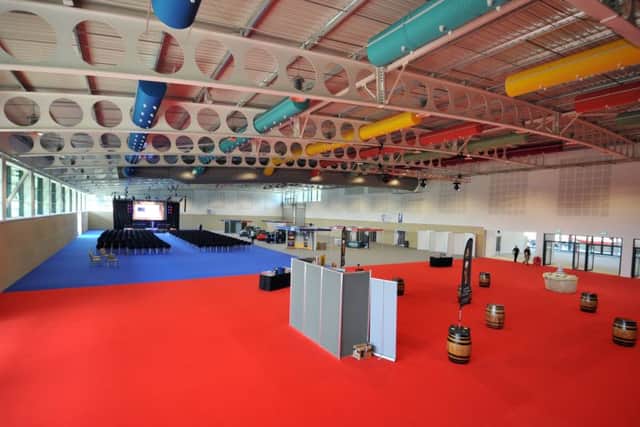 The main exhibition space was split up into 'live rooms' featuring different uses of the hall at today's opening ceremony. (GL1010/36m)