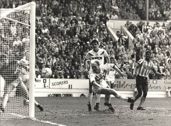 12 April 1987. Leeds United players Neil Aspin and goalkeeper Mervyn Day try unsuccessfully to block a shot from Coventry City substitute Micky Gynn (out of picture) in the FA Cup semi final at Hillsborough.
