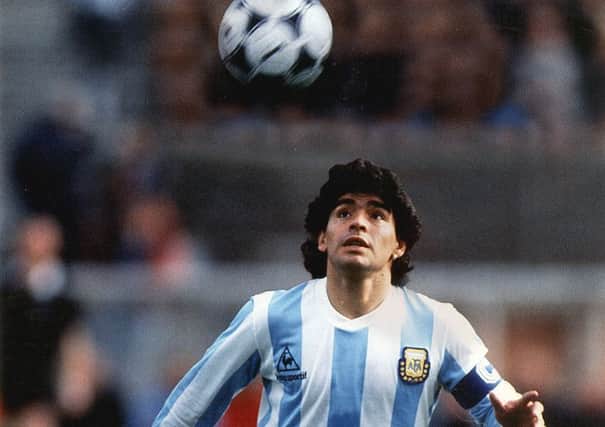 England's nemesis Diego Maradona in action in his beloved Argentina shirt.