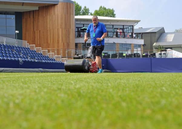 Head groundsman Richard Lord prepares the courts at the Ilkley Tennis Club aahead of the Aegon Ilkley Trophy. Picture: Tony Johnson