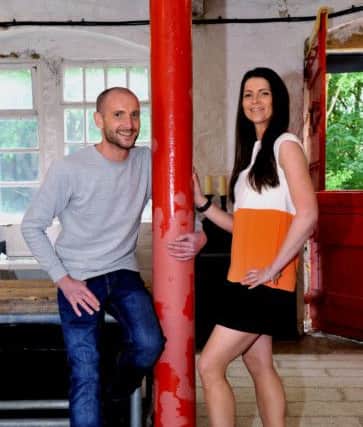 James and Hannah, who is wearing one of her brother's designs.

020616  Fashion Designer James Steward  with his sister Hannah Moody  at his workshop at Farsley near Leeds (Gl1010/30c)
