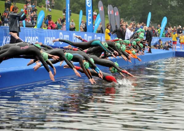 Youths start the swim in Roundhay Park. Picture Tony Johnson