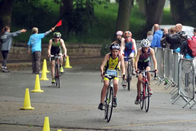 Youths cycle in Roundhay Park  Picture Tony Johnson