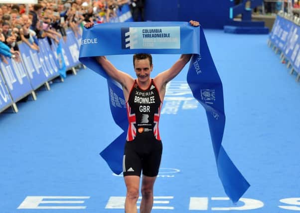 Alistair Brownlee celebrates winning the 2016 ITU World Triathlon in Leeds.