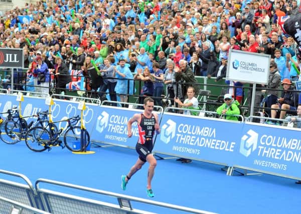 Alistair Brownlee charges to the winning line in Leeds.