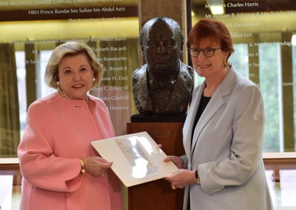 Barbara Taylor Bradford presenting her letter from Lady Churchill to the Churchill Archives Centre in Cambridge.