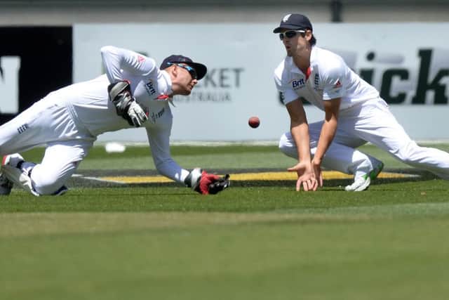 Alastair Cook, right, admits that Jonny Bairstow, left, is keen to improve as an international wicket-keeper. Picture: PA