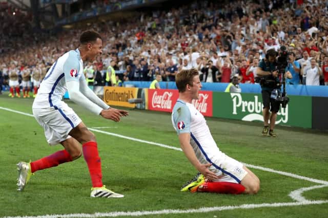 England's Eric Dier (right) celebrates scoring against Russia. PIC: PA