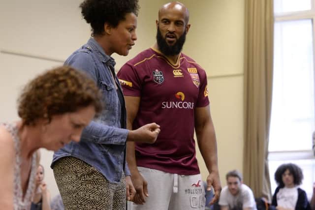 Jamie Jones-Buchanan and fellow cast members during rehearsals for the play.