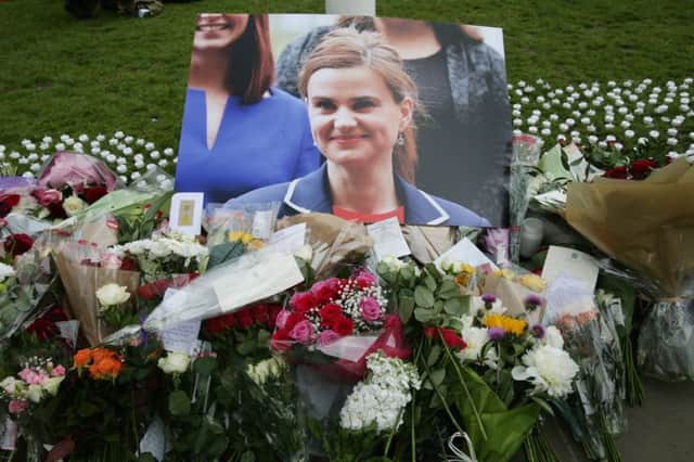 Floral tributes to Jo Cox in Parliament Square, London