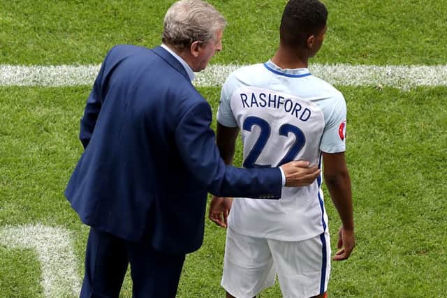 England manager Roy Hodgson gives instructions to Marcus Rashford on the touchline in Lens before sending him on as a substitute against Wales. Picture: Owen Humphreys/PA.