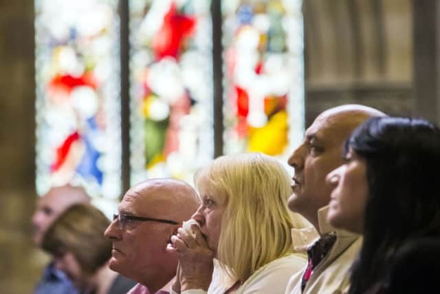 Churchgoers during a service for Jo Cox at St Peter's Church in Birstall. PIC: PA