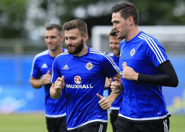 Leeds United's Stuart Dallas alongside one-time target Kyle Lafferty (right) in the Northern Ireland training camp.