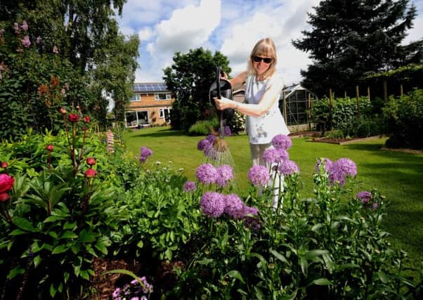 Jenni Elliott gets her garden ready for Sundays event. PIC: Simon Hulme