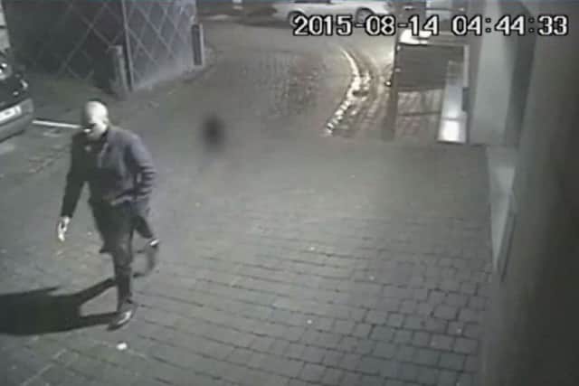 A CCTV still showing the suspected rapist in Leeds on the night of the attack.
