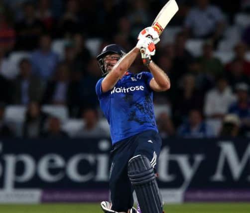 England's Liam Plunkett hits a six off the final ball to tie the match. Picture: Simon Cooper/PA.