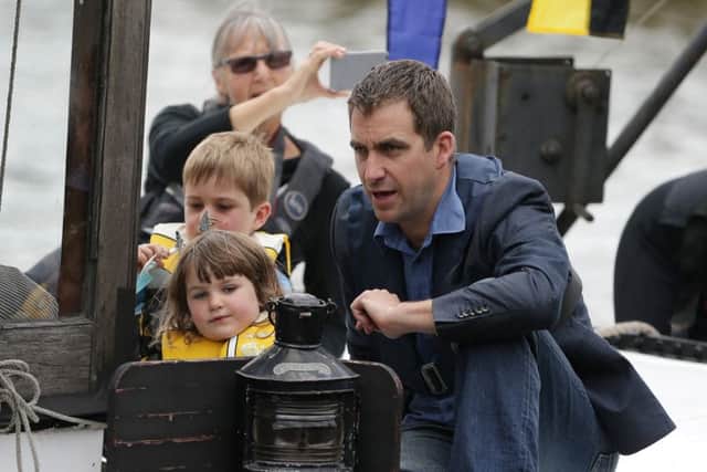 Brendan Cox, the widower of Labour MP Jo Cox, and their children Cuillin and Lejla, make their way along the River Thames, London, to Westminster for an event in Trafalgar Square to celebrate what would have been her 42nd birthday.