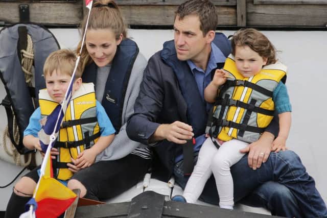 Brendan Cox, the widower of Labour MP Jo Cox, and their children Cuillin and Lejla their way along the River Thames to Trafalgar Square