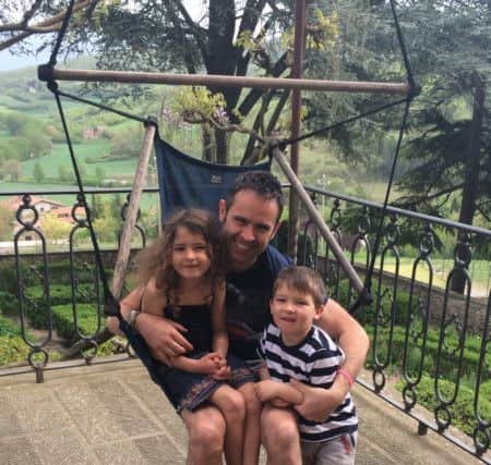 Paul Verrico, whose wife died three years ago, with his two children.