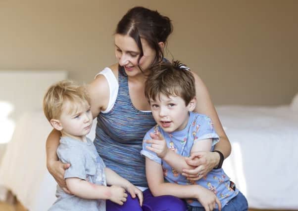 Sarah Lambley with her sons Finnian and Roman
