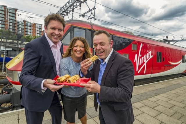 Date: 21st June 2016. Picture James Hardisty.
Virgin Trains executive chef James Martin, with one of the Yorkshire suppliers James Wright, from Taste Tradition based in Ripon and Ali Watson, Director of Customer Experience at Virgin Trains East Coast at Leeds City Station to promote the new First Class menu on the service.