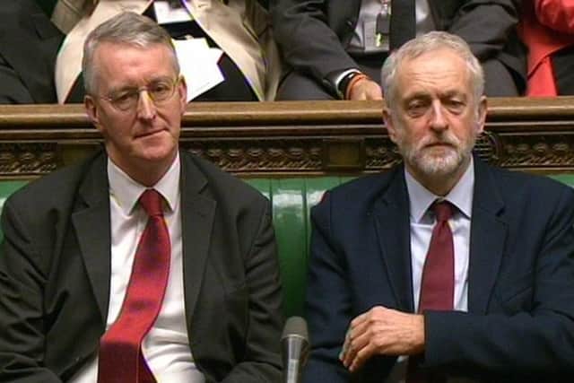 Labour Party leader Jeremy Corbyn (right) and former Shadow foreign secretary Hilary Benn who he has sacked after he raised concerns about his leadership.