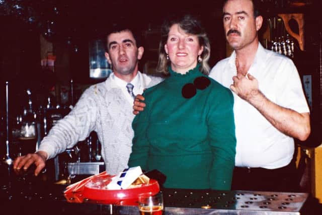 BACK IN THE DAY: Noel, Carmel and Martin Roarty behind the bar of The Harp.