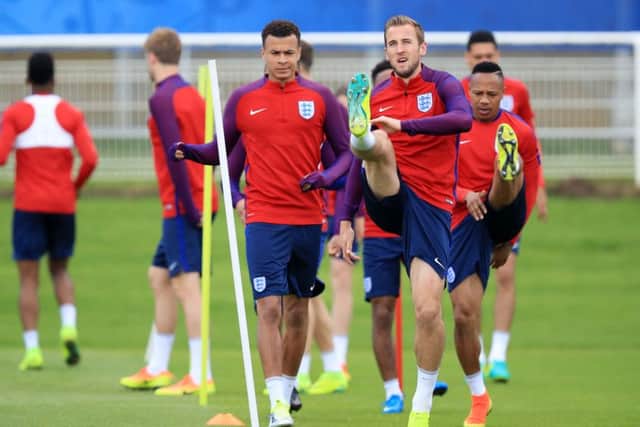 England's Harry Kane and Dele Alli, left, during a training session at Chantilly. Picture: Mike Egerton/PA.