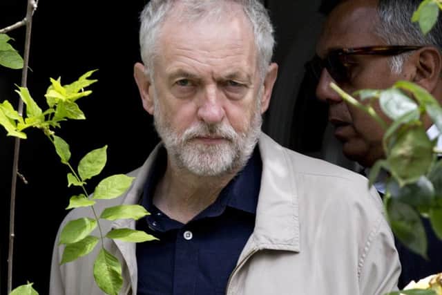 Labour leader Jeremy Corbyn leaves his house in London. Corbyn is facing a full-scale revolt by his top team as a string of shadow ministers quit in protest at his leadership during the EU referendum campaign.