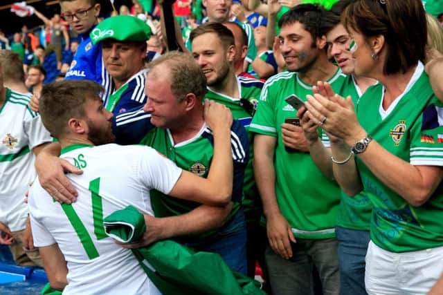 Northern Ireland's Stuart Dallas hugs fans after the round of 16 match at the Parc de Princes, Paris. (Picture: Jonathan Brady/PA Wire)