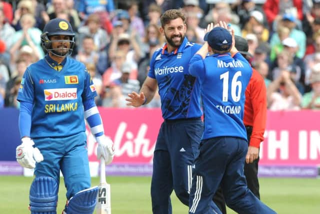 IN FORM: England and Yorkshires Liam Plunkett (centre) celebrates with Eoin Morgan after bowling Sri Lankas Kusal Mendis at Bristol on Sunday. Picture: Rui Vieira/PA.