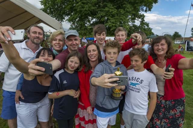 Oscar winning producer Serena Artimage made a surprise visit to the Nun Monkton village fete, near York, to show off her Oscar, to local school children that she won in the short Film Live Action category in this year's 2016 Oscars ceremony, pictured having a selfie with visitors to the fete. Picture: James Hardisty