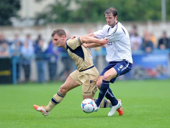 Leeds United clash with Guiseley at Nethermoor in 2014.