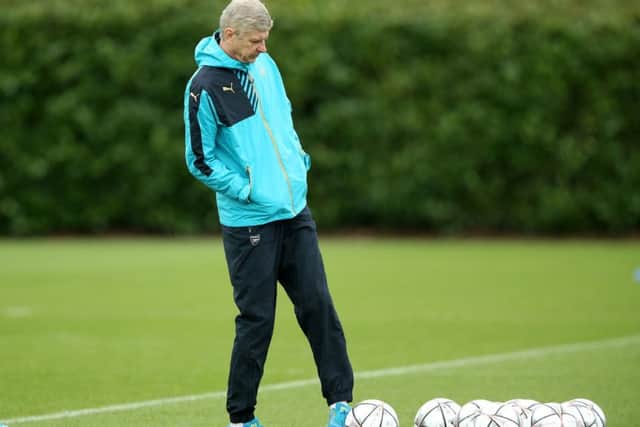TEMPTED? Arsenal manager Arsene Wenger. Picture: Adam Davy/PA.
