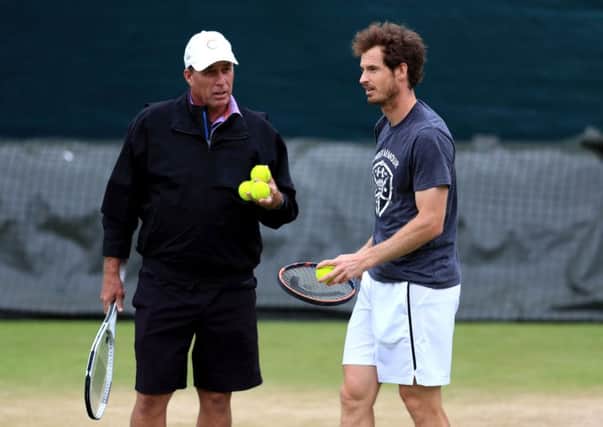Andy Murray is watched by coach Ivan Lendl during a practice session onahead of his second matcn on Thursday. Picture: Adam Davy/PA.