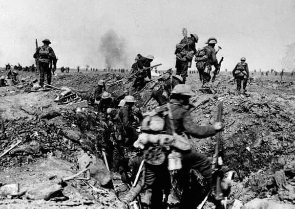 Library filer dated 25/09/1916 of British troops negotiating a trench as they go forward in support of an attack on the village of Morval during the Battle of the Somme. The date of July 1, 1916, is remembered as the bloodiest day in the history of the British Army. PRESS ASSOCIATION Photo. Issue date: Sunday June 25, 2006. The Battle of the Somme began at 7.30am that day, and by the following morning 19,240 British soldiers had died. The battle continued for more than four months, leaving a final casualty tally for all sides of well over a million. See PA story WAR Somme History. Photo credit should read: PA.