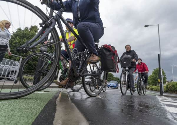 Cyclists take to two wheels for the launch of the first section City Connect in Thornbury, Bradford. Picture by James Hardisty.