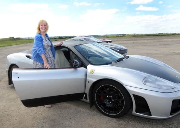 Sarah Cernis pictured during her supercar driving experience.