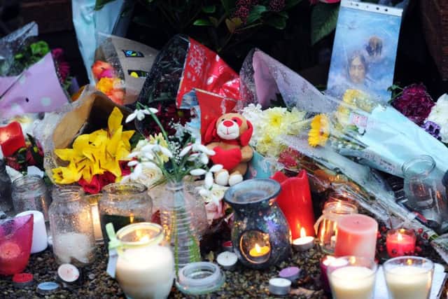 Flowers left at the memorial service for Daria Pionko was found on Springwell Road, Holbeck.
Picture : Jonathan Gawthorpe