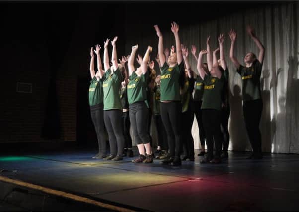 A dance performance on the Hunslet Club's stage.