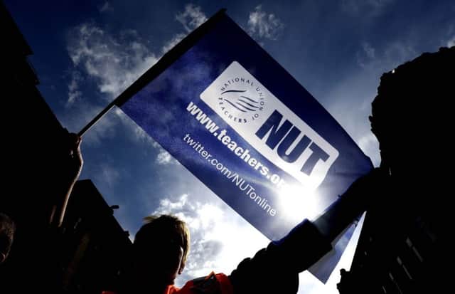 Members of the National Union of Teachers are taking action today across the country. Photo: Owen Humphreys/PA Wire