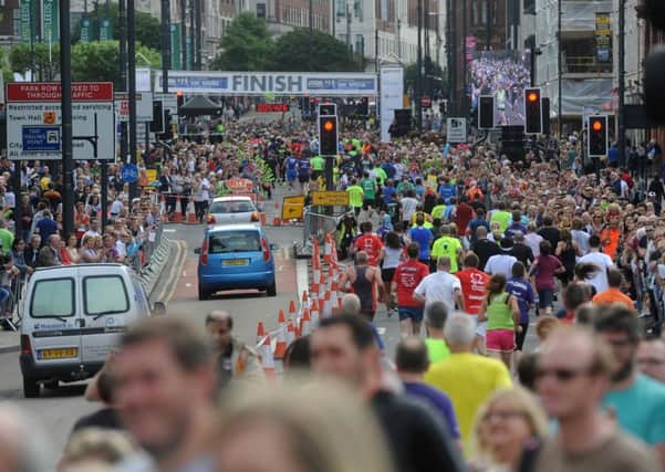 Crowds on the Headrow during last year's Jane Tomlinson Run for All Leeds 10K