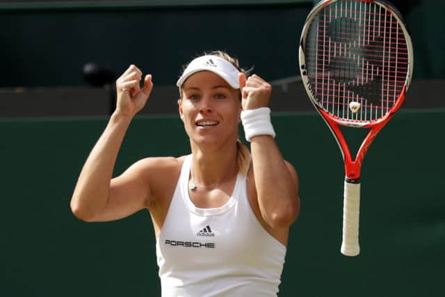 Angelique Kerber celebrates beating Venus Williams.