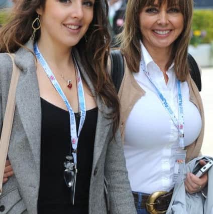 08/07/12 PA File Photo of Carol Vorderman (right) and daughter Katie in the paddock before the British Grand Prix at Silverstone Circuit, Silverstone. See PA Feature WELLBEING Vorderman. Picture credit should read: Martin Rickett/PA Photos. WARNING: This picture must only be used to accompany PA Feature WELLBEING Vorderman