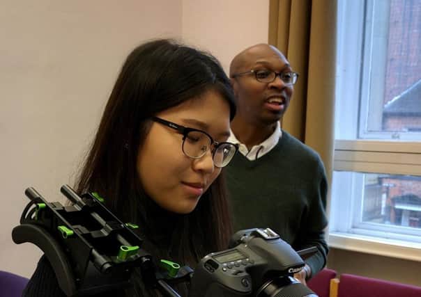 BFI Film Academy participant Joyee Wong in a cinematography workshop with Errol Murray.