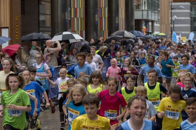 The start of today's Arena Group Junior Run at Leeds Dock. Picture James Hardisty.