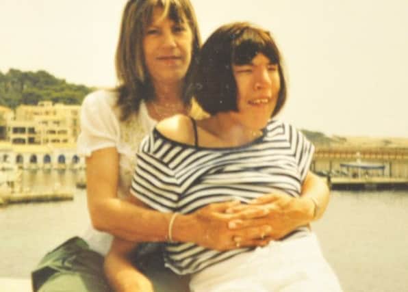 Pictured - Collect of Alison with mum Elizabeth while on a trip to Spain. See Ross Parry copy RPYCHOKE. An American gum that caused a severely disabled woman to choke and die was 
supplied by a senior support worker, an inquest heard.
Alison Evers, 34, had trouble chewing and could only swallow small pieces of food, but she was still handed one of the hard sweets by care worker Tracey Gilboy.This led to the petite woman having trouble breathing, turning blue and then going into cardiac arrest. Four days later she died in hospital.