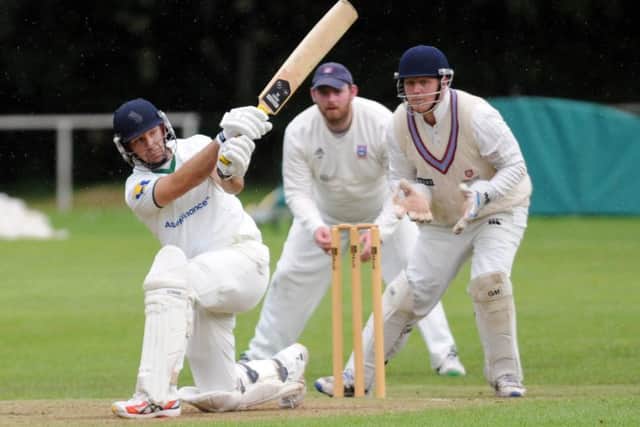 James Middlebrook sweeps four runs during his innings of 71 not out for winners New Farnley, helping his side to a six0wicket win against Pudsey Congs. Picture: Steve Riding.